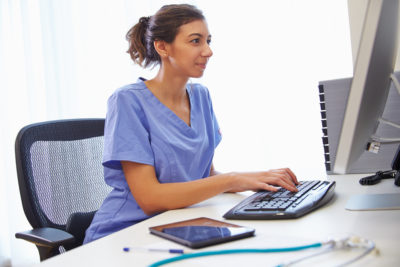 Nurse Taking an Online Wound Care Certification Course