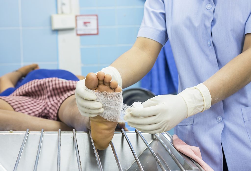 nurse doing dressing